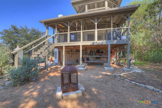 rear view of house with a deck