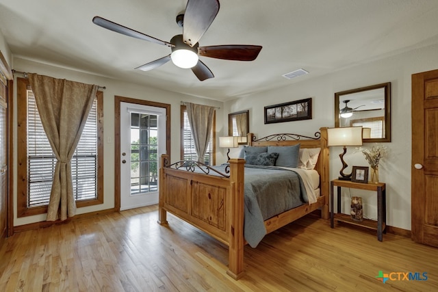 bedroom with access to outside, light hardwood / wood-style flooring, and ceiling fan