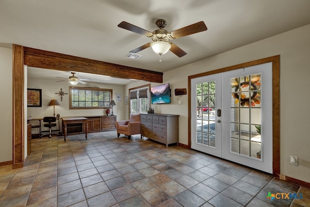 interior space featuring french doors, ceiling fan, and beam ceiling