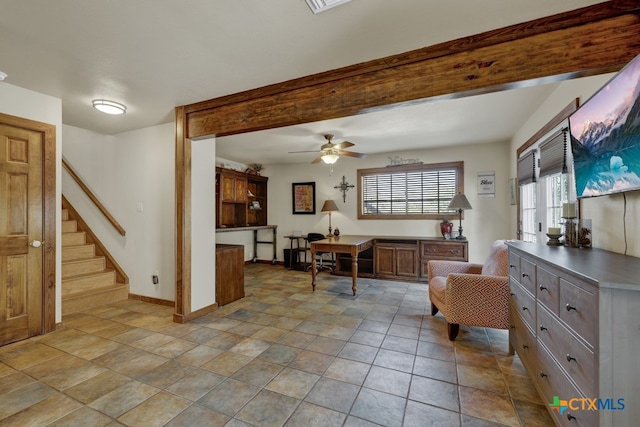 living area featuring light tile patterned flooring and ceiling fan