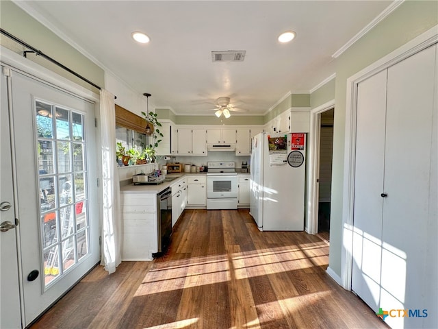 kitchen with dark hardwood / wood-style flooring, ornamental molding, white appliances, ceiling fan, and white cabinets