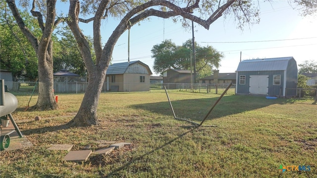 view of yard featuring a storage unit