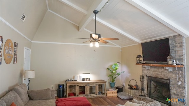 living room with ceiling fan, beam ceiling, high vaulted ceiling, a fireplace, and hardwood / wood-style floors