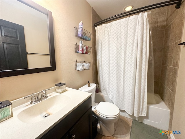 full bathroom featuring tile patterned flooring, vanity, shower / bath combo, and toilet