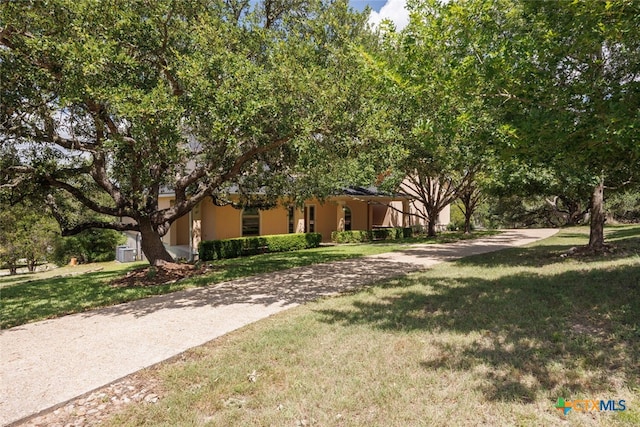 2291 Frontier, Spring Branch, TX 78070 - view of grassy yard with driveway