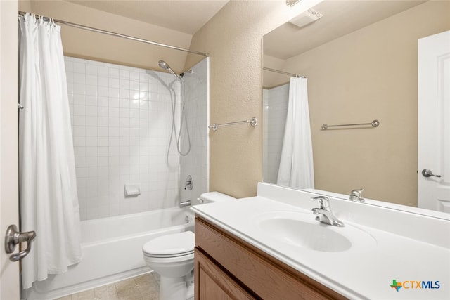 2291 Frontier, Spring Branch, TX 78070 - full bathroom featuring vanity, shower / tub combo, a textured wall, and tile patterned flooring