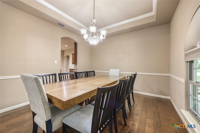 2291 Frontier, Spring Branch, TX 78070 - dining room with arched walkways, hardwood / wood-style floors, a chandelier, ornamental molding, and a tray ceiling