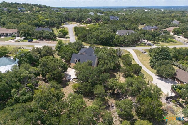 2291 Frontier, Spring Branch, TX 78070 - aerial view of property and surrounding area with nearby suburban area