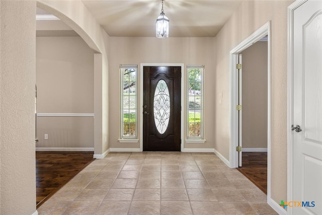 2291 Frontier, Spring Branch, TX 78070 - foyer entrance with arched walkways and wood finished floors