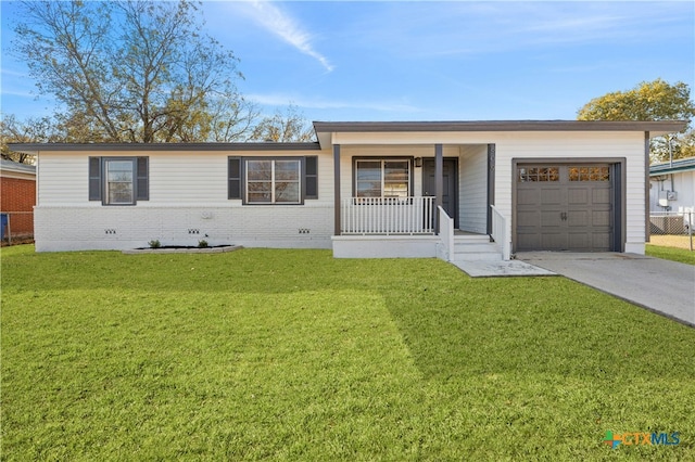 ranch-style house with covered porch, a front yard, and a garage