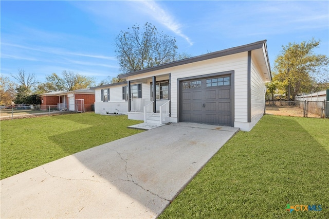 ranch-style home featuring a porch, a garage, and a front lawn