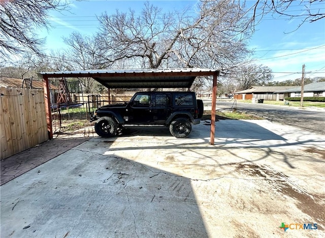 view of parking with a carport