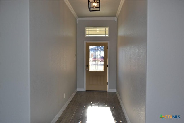 entryway featuring crown molding