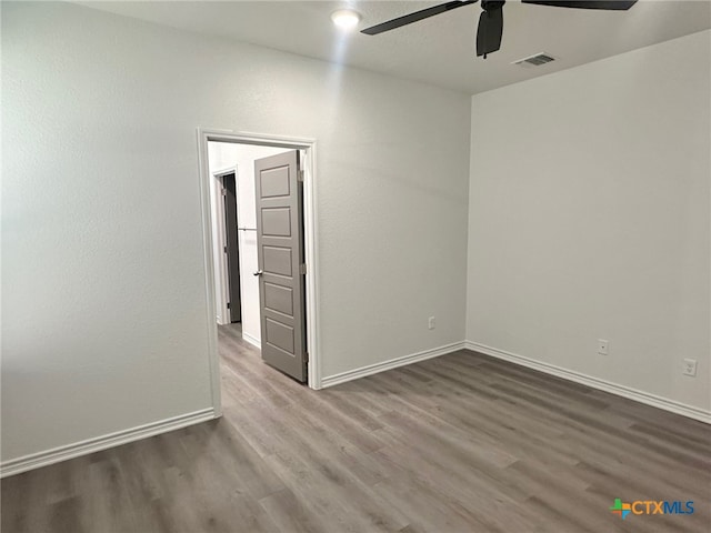 2226 Wooster St, Nolanville, TX 76559 - unfurnished room with visible vents, baseboards, a ceiling fan, and wood finished floors