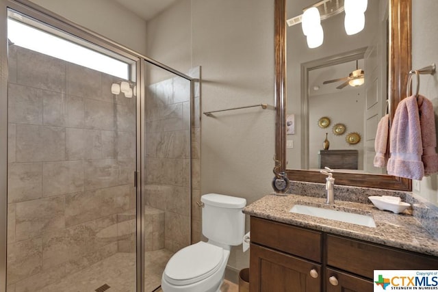 505 Cantera Rdg, New Braunfels, TX 78132 - bathroom with a stall shower, vanity, and toilet