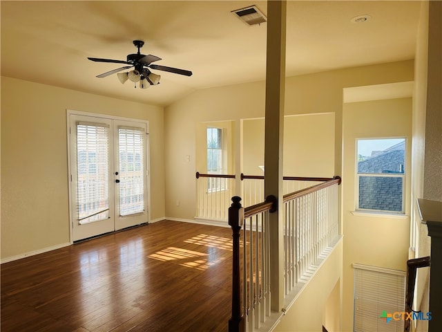 interior space featuring french doors, dark wood-type flooring, ceiling fan, and lofted ceiling