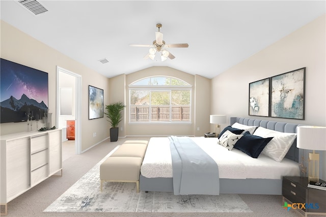 carpeted bedroom featuring ceiling fan and vaulted ceiling