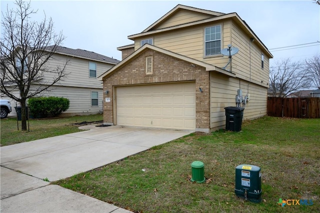 view of side of home with a lawn and a garage