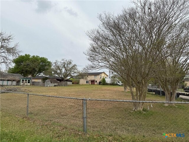 view of front of house with fence