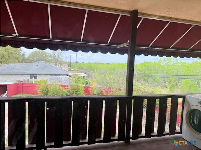 exterior space with washer / dryer