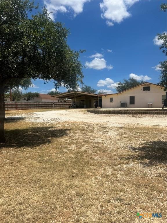 1102 Crockett, Cotulla, TX 78014 - back of house featuring fence