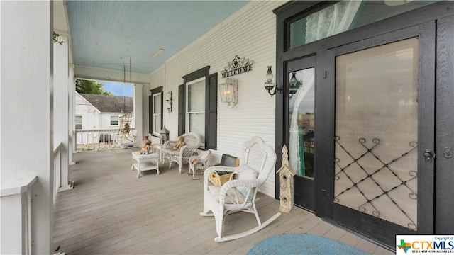 wooden deck with covered porch