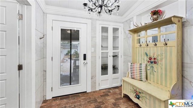 mudroom with ornamental molding and a notable chandelier