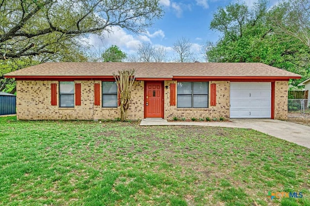 1117 Lindsey Cir, Belton, TX 76513 - single story home featuring fence, an attached garage, driveway, a front yard, and brick siding