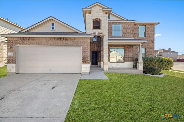 view of front facade featuring a garage and a front yard