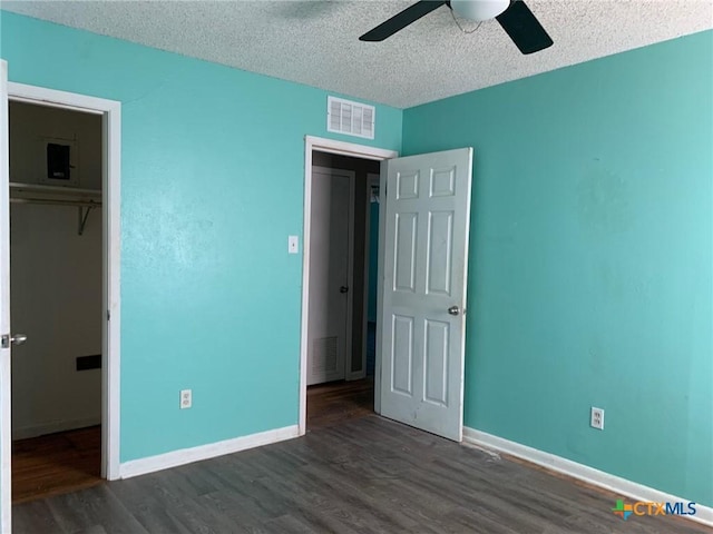 701 S 19th St, Copperas Cove, TX 76522 - unfurnished bedroom featuring wood finished floors, a textured ceiling, and ceiling fan