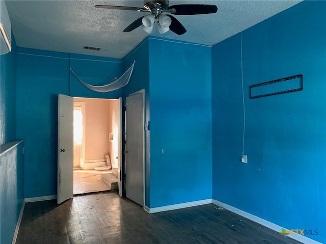 701 S 19th St, Copperas Cove, TX 76522 - unfurnished room with a textured ceiling, a ceiling fan, and wood finished floors