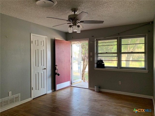 701 S 19th St, Copperas Cove, TX 76522 - entryway with ceiling fan, wood finished floors, and a textured ceiling