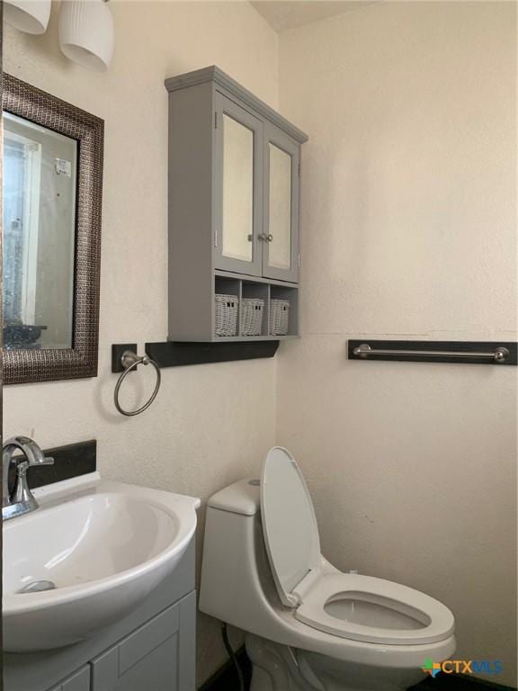 701 S 19th St, Copperas Cove, TX 76522 - bathroom featuring toilet and vanity