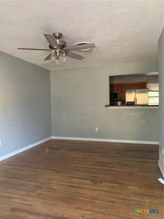 701 S 19th St, Copperas Cove, TX 76522 - empty room featuring a ceiling fan, a textured ceiling, and wood finished floors