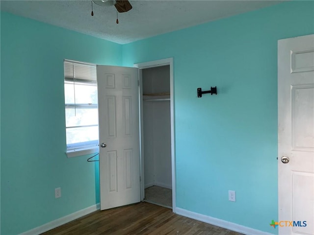 701 S 19th St, Copperas Cove, TX 76522 - unfurnished bedroom with wood finished floors, a closet, and a textured ceiling