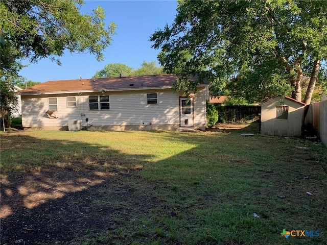 701 S 19th St, Copperas Cove, TX 76522 - rear view of property featuring a shed