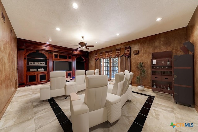 home theater featuring ceiling fan