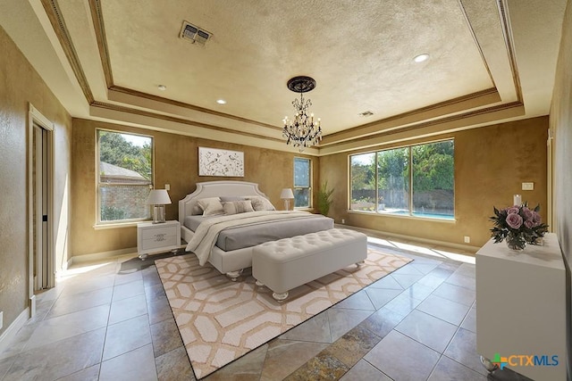 bedroom with ornamental molding, a raised ceiling, and a notable chandelier