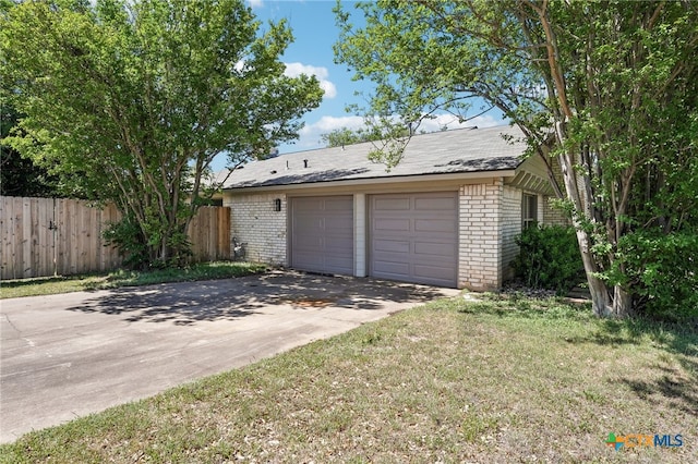 garage with fence