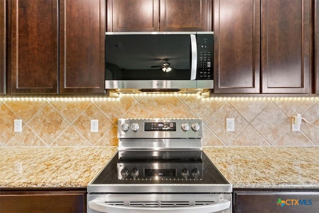 4004 Brookhaven Dr, Temple, TX 76504 - kitchen featuring stainless steel appliances, dark brown cabinets, backsplash, and ceiling fan
