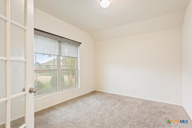 4004 Brookhaven Dr, Temple, TX 76504 - carpeted empty room featuring lofted ceiling and baseboards