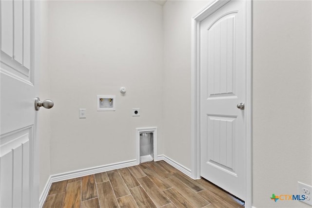 812 Waylon Cir, Killeen, TX 76542 - laundry room featuring electric dryer hookup, hookup for a washing machine, hookup for a gas dryer, and wood finished floors