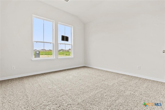 812 Waylon Cir, Killeen, TX 76542 - empty room with lofted ceiling and carpet flooring