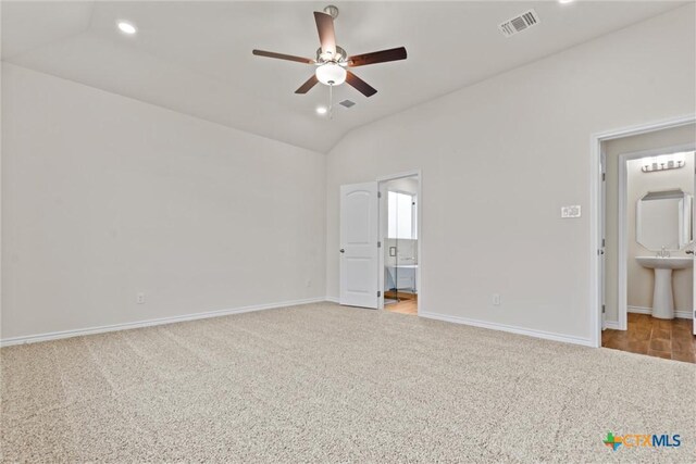 812 Waylon Cir, Killeen, TX 76542 - unfurnished bedroom featuring carpet, connected bathroom, lofted ceiling, recessed lighting, and a ceiling fan