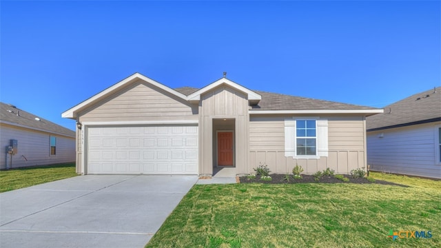 ranch-style house with a garage and a front lawn