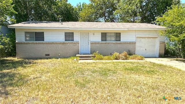 single story home with a garage and a front yard