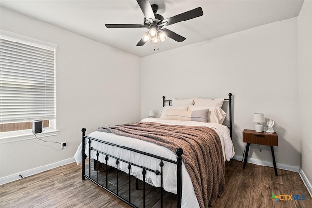 bedroom featuring ceiling fan and wood-type flooring