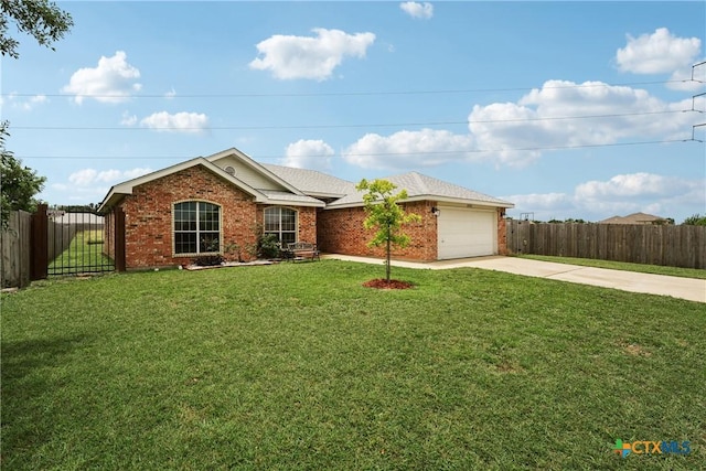 2606 Wesley Dr, Killeen, TX 76549 - single story home featuring driveway, an attached garage, and brick siding