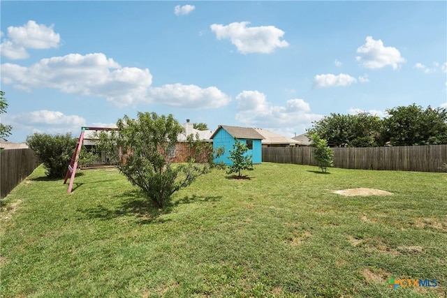 2606 Wesley Dr, Killeen, TX 76549 - fenced backyard with a storage unit