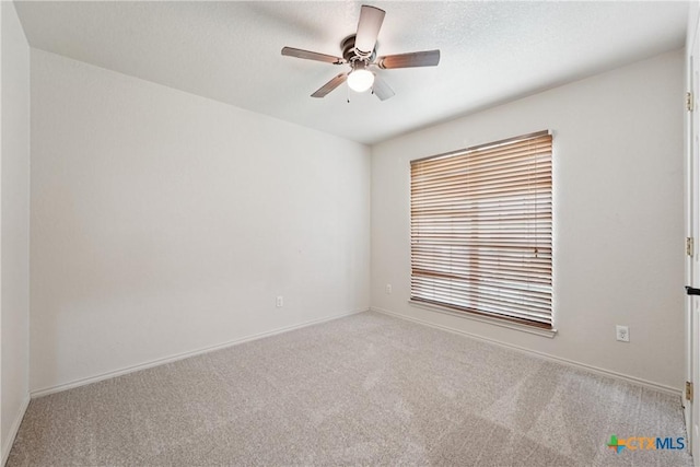 2606 Wesley Dr, Killeen, TX 76549 - carpeted spare room featuring a ceiling fan and baseboards